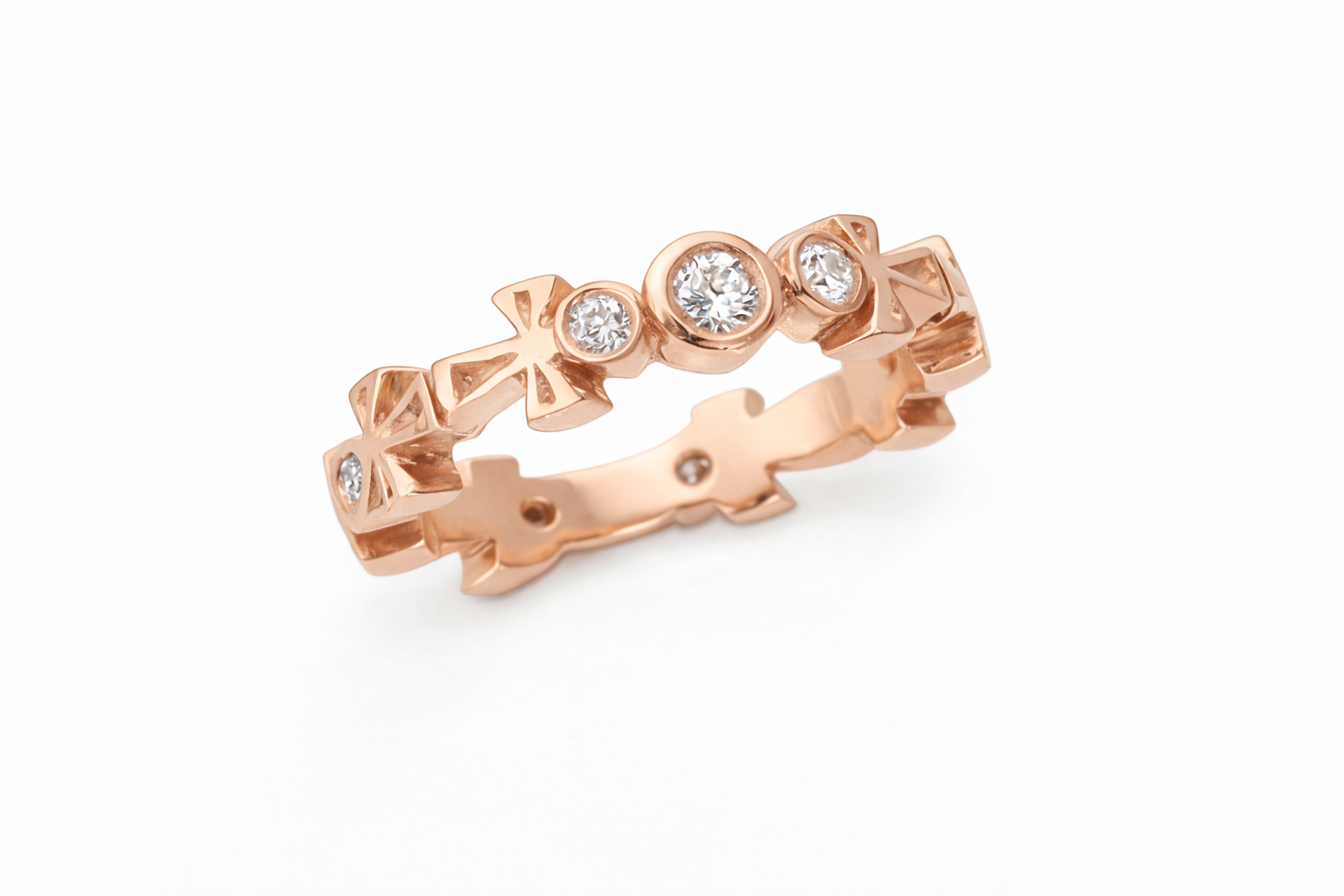 Rose Gold Ankh Eternity Band with diamond accents on a white background