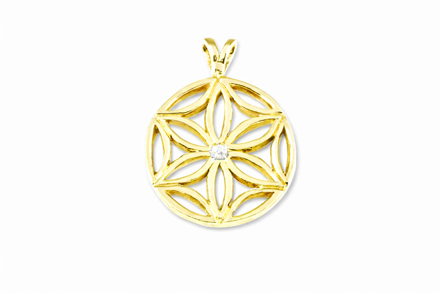 Gold pendant with a flower of life design on a white background