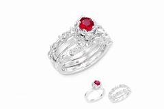 18k white gold 2 part ring set with ruby on a white background