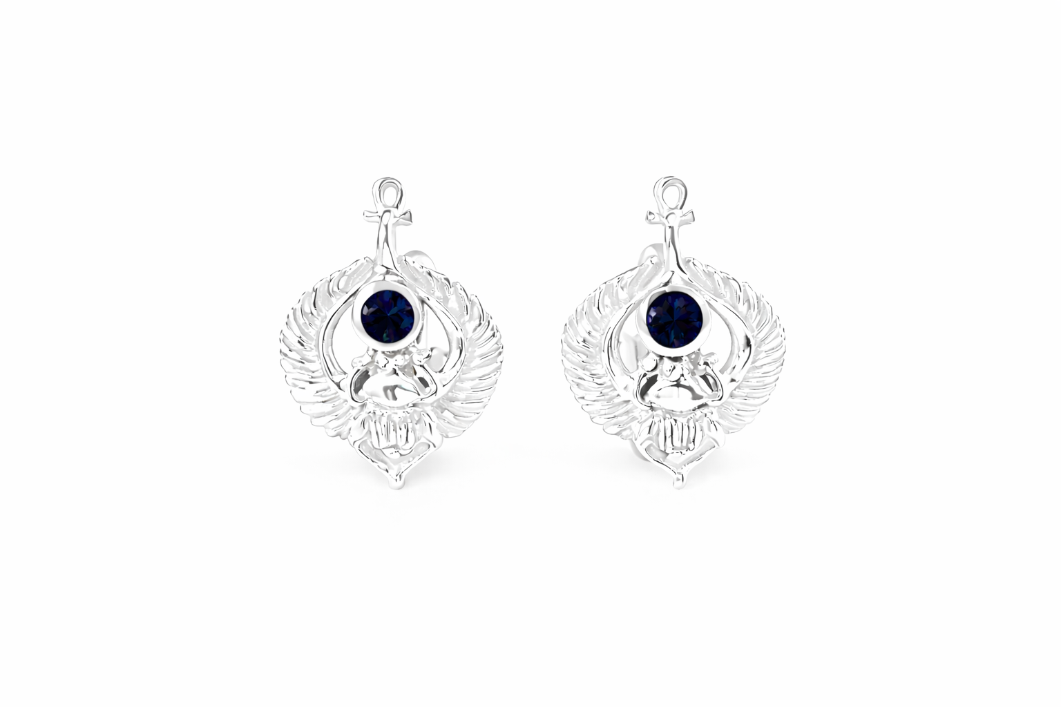 Winged Scarab Cufflinks w/ Sapphires in white gold attached to the top of each cufflink.