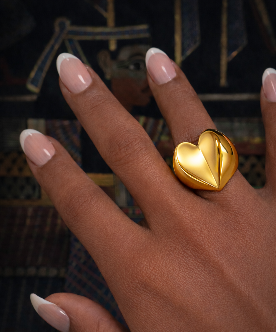 Chunky heart ring called a piece of my heart in yellow gold