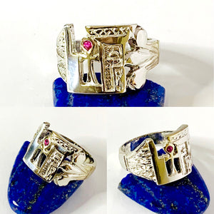 silver sacred woman ring with a geometric and floral design, featuring a central Ankh symbol, and adorned with a red birthstone.