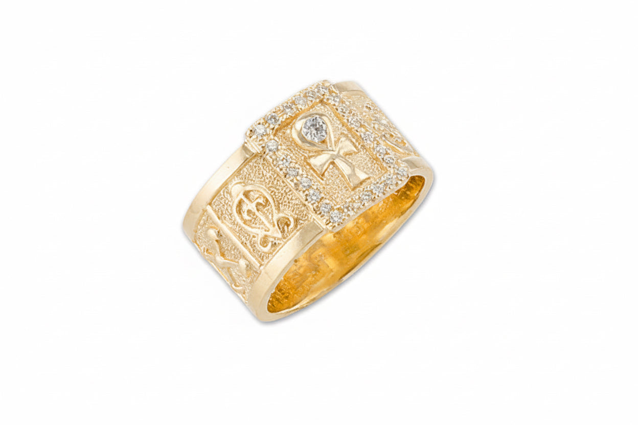 A yellow gold Ankh and Adinkra wedding band ring with a main Ankh symbol and smaller white diamonds set within the band.