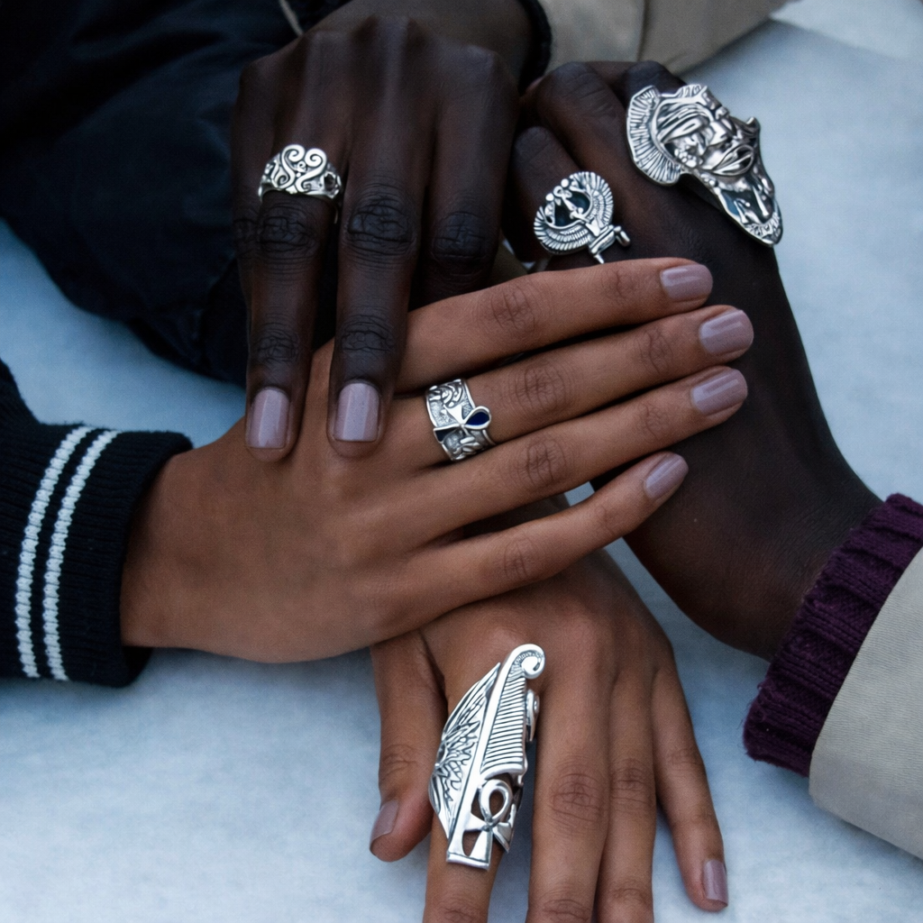 hands wearing studio of Ptah silver rings