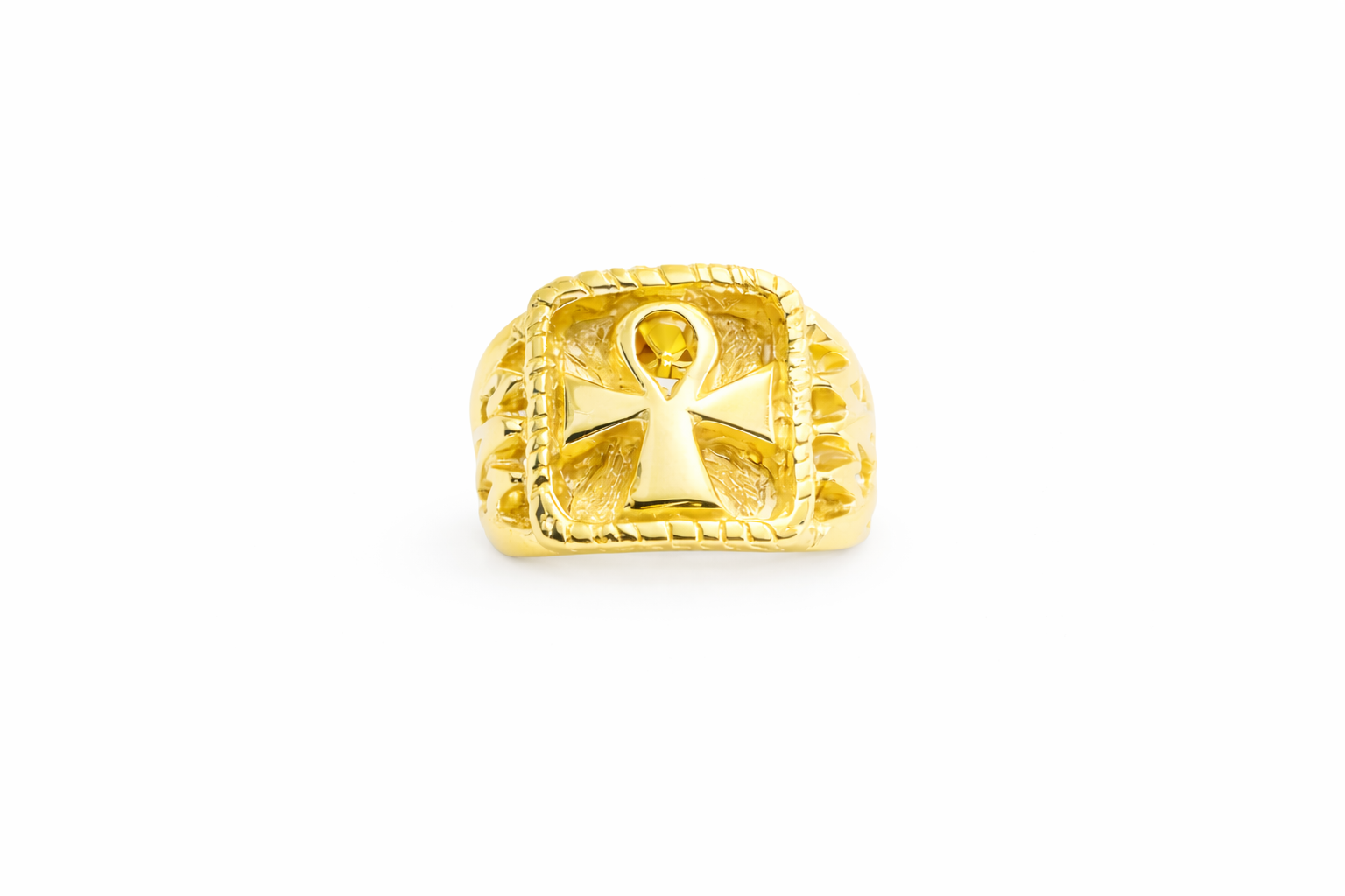 Gold ring with an ankh symbol on a white background