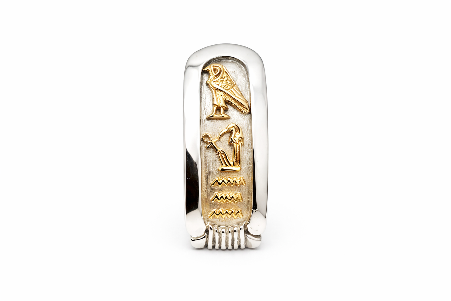 Silver and gold ring with hieroglyphics on a white background