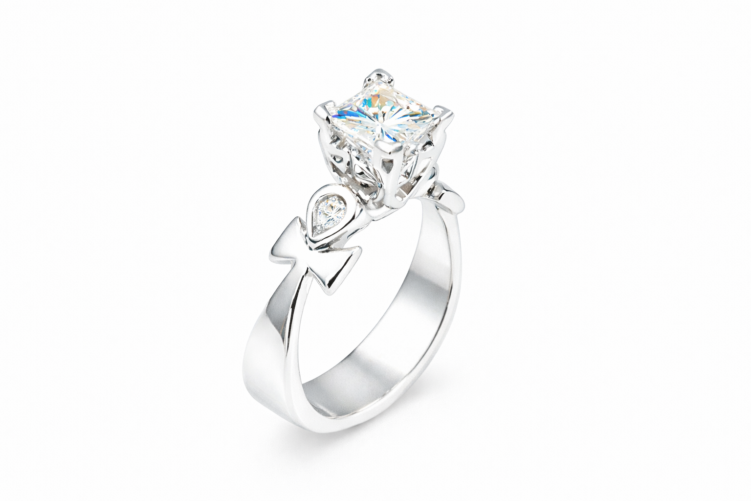 platinum three stone ring with a large diamond and smaller diamonds on a white background