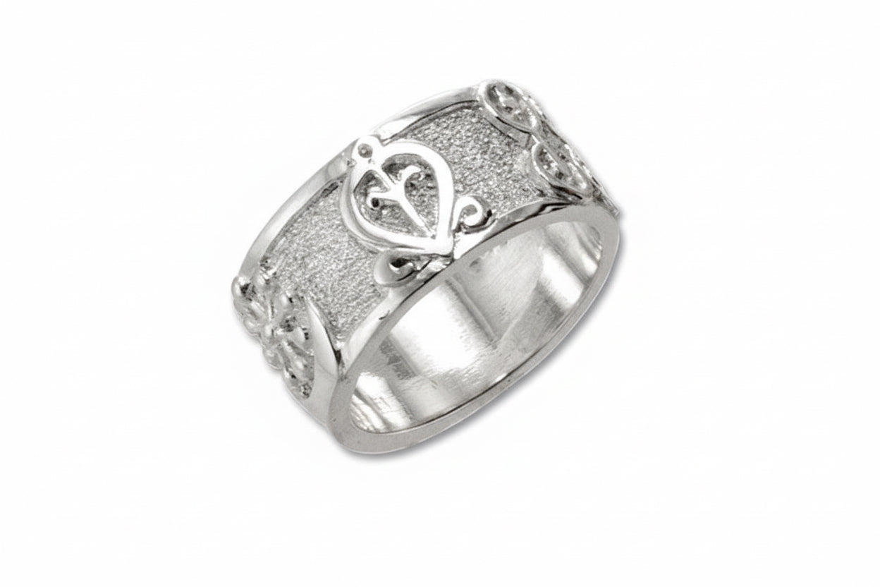 An 18k yellow gold wedding band with Adinkra symbols on the top surface, featuring a textured background.