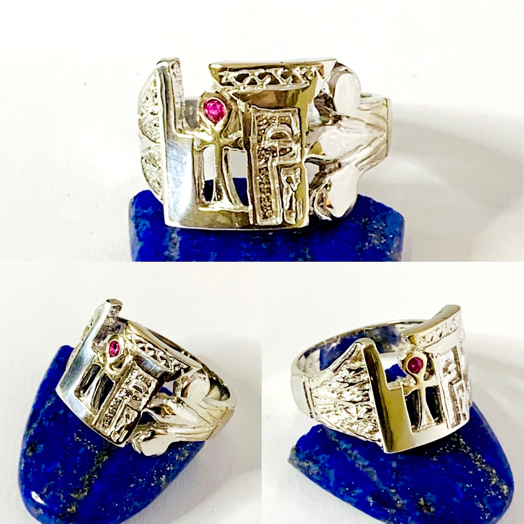 silver sacred woman ring with a geometric and floral design, featuring a central Ankh symbol, and adorned with a red birthstone.