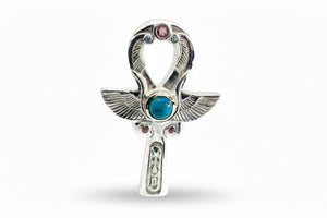 Sterling silver ankh ring with a large main stone in a gold bezel, surrounded by six smaller stones, displayed against a white background.