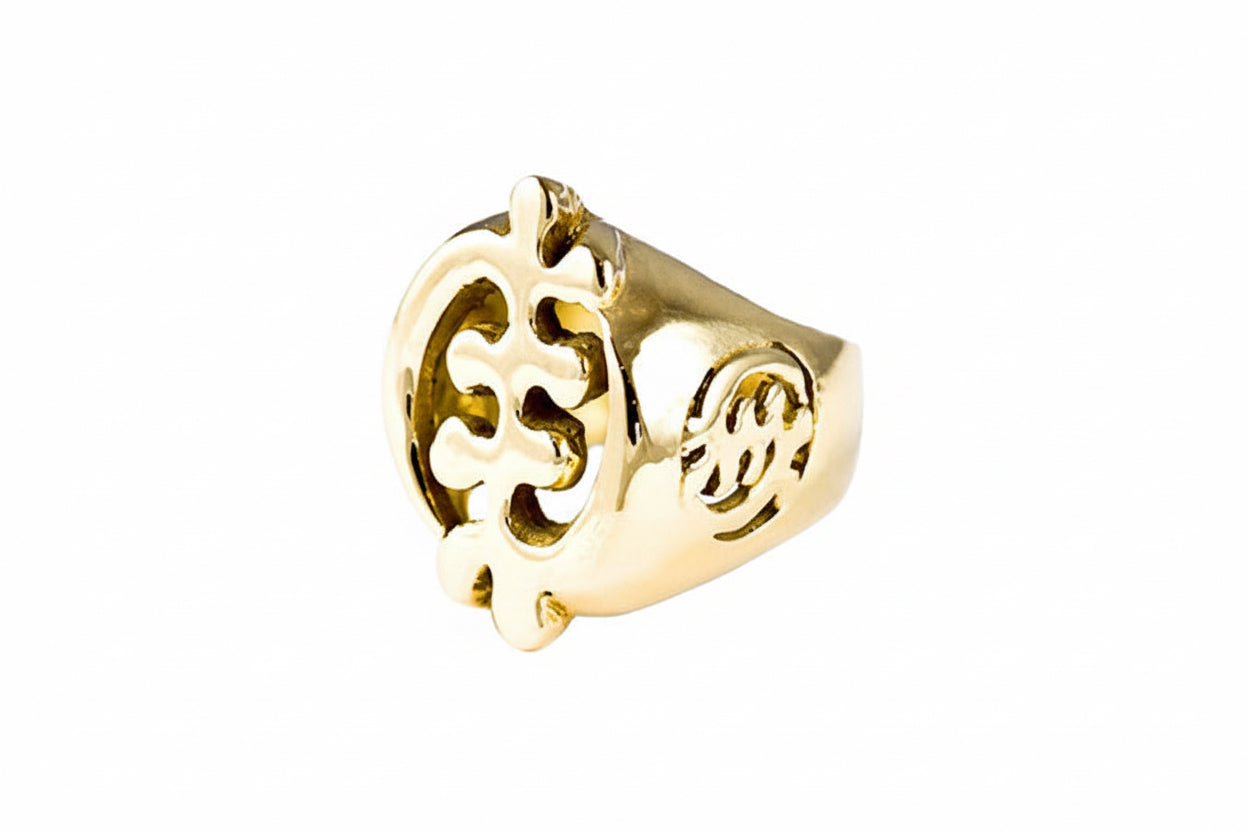 Yellow gold gye nyame ring with gye nyame Edina symbols on the side.