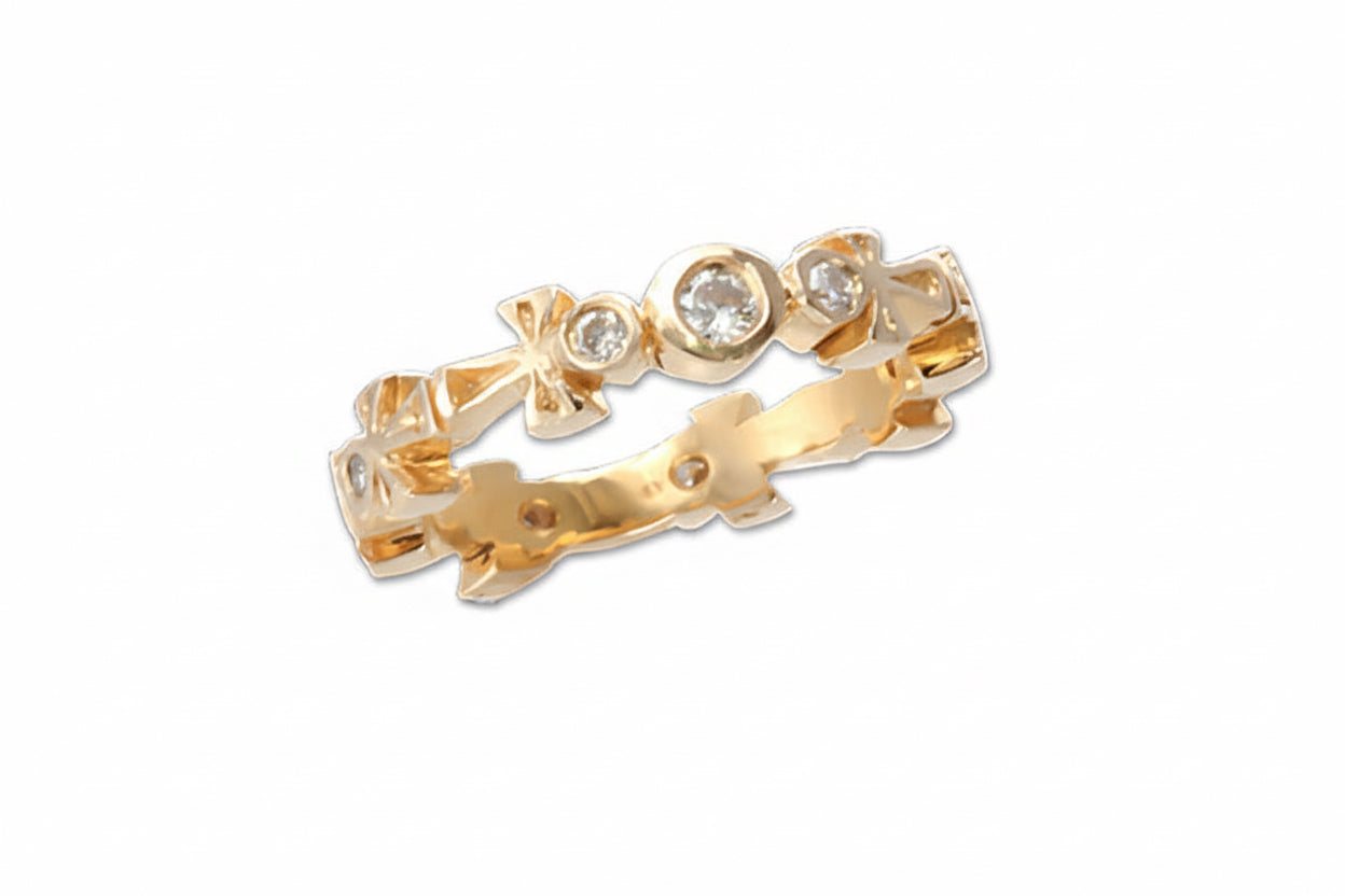 18k Yellow gold eternity band featuring a series of diamond encrusted ankhs.